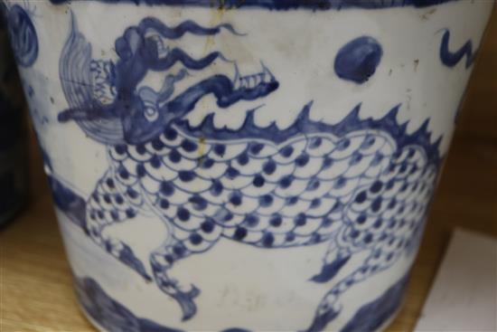 A pair of Chinese blue and white qilin ice pails height 20cm